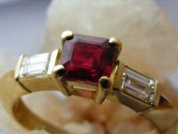 Ruby and diamond three stone image